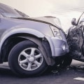 What is the first thing you should do at an accident scene?
